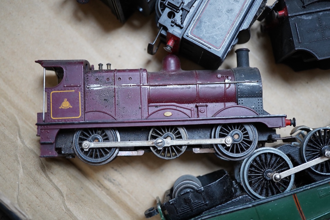 Three part-built 0 gauge railway brass and white metal locomotives by John Worsley; an ACE Products kit of an SR Bullied light Pacific with its original box, a SECR Wainwright H class 0-4-4T locomotive and an LNER class